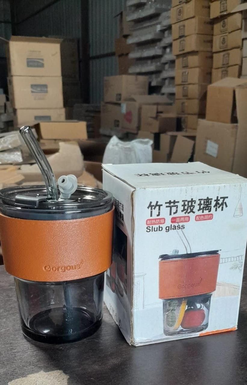 Glass water bottle with straw